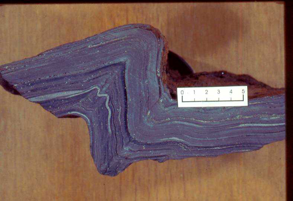 Sedimentary iron formation composed of hematite-rich bands