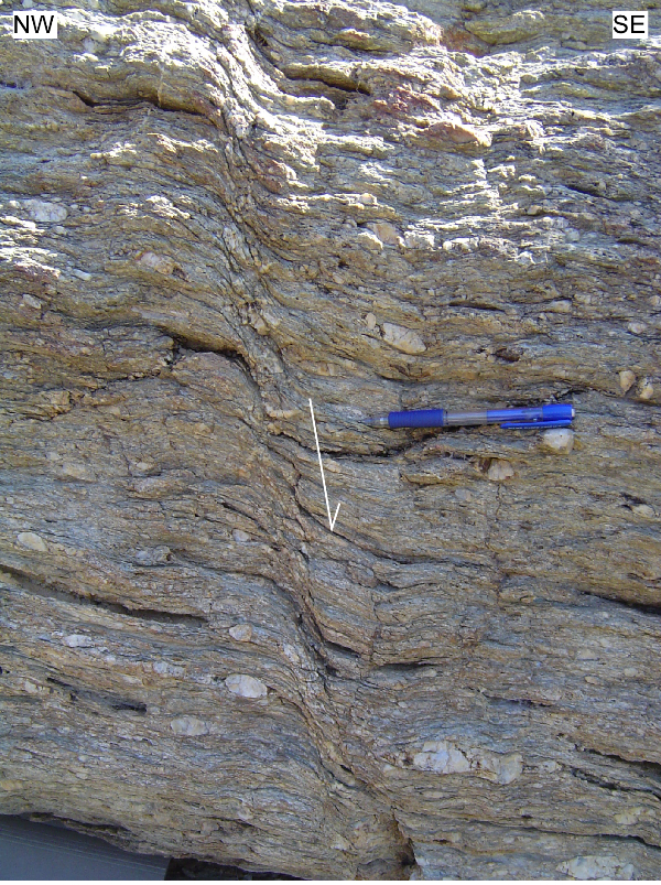 High-angle shear bands in a conglomerate (Stop 1.1) showing top-to-the-SE sense of shear. Sample AMO 05-1 from this conglomerate yielded a zircon fission-track age of 161±15 Ma.